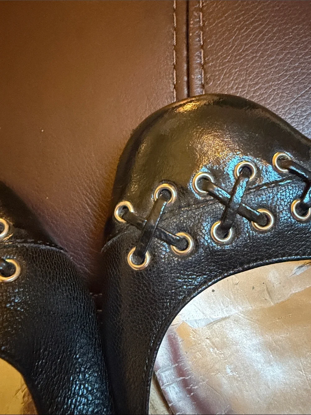 Micheal Kors black flats with grommet /leather detail sz 9.5